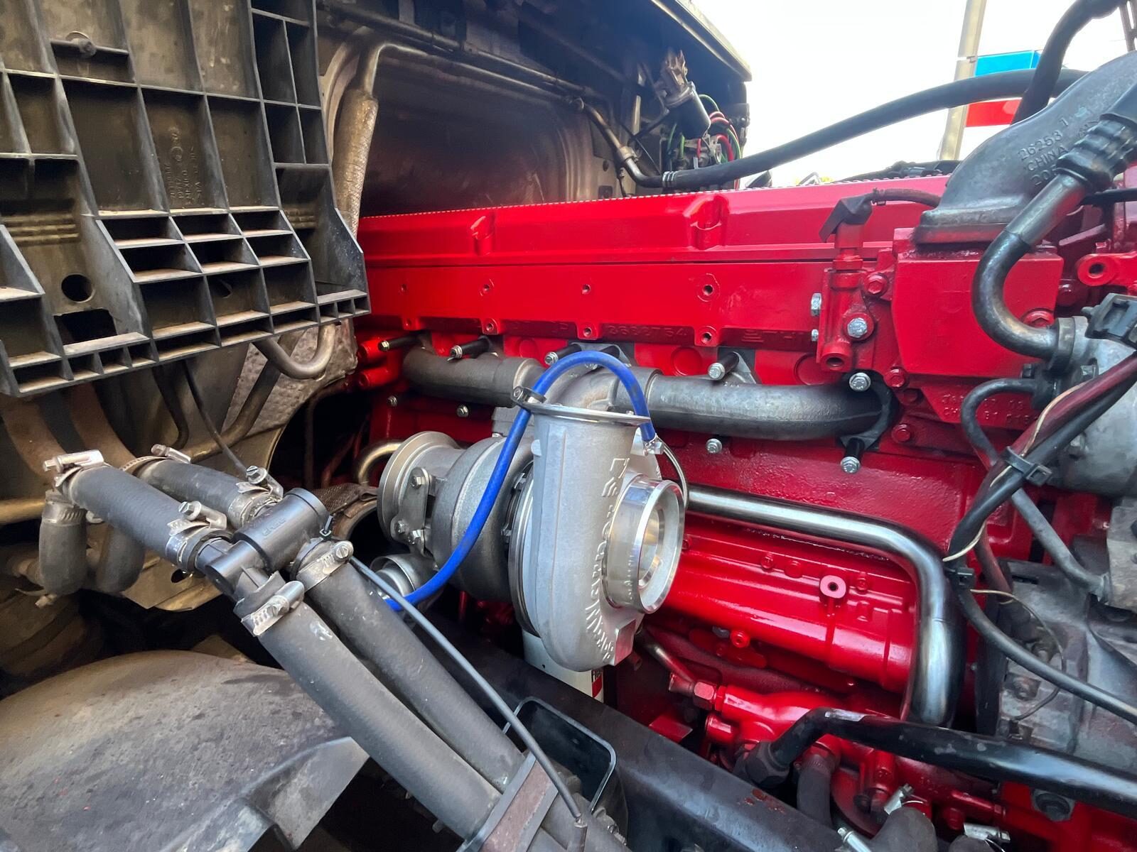Diesel engine installed in a truck engine bay