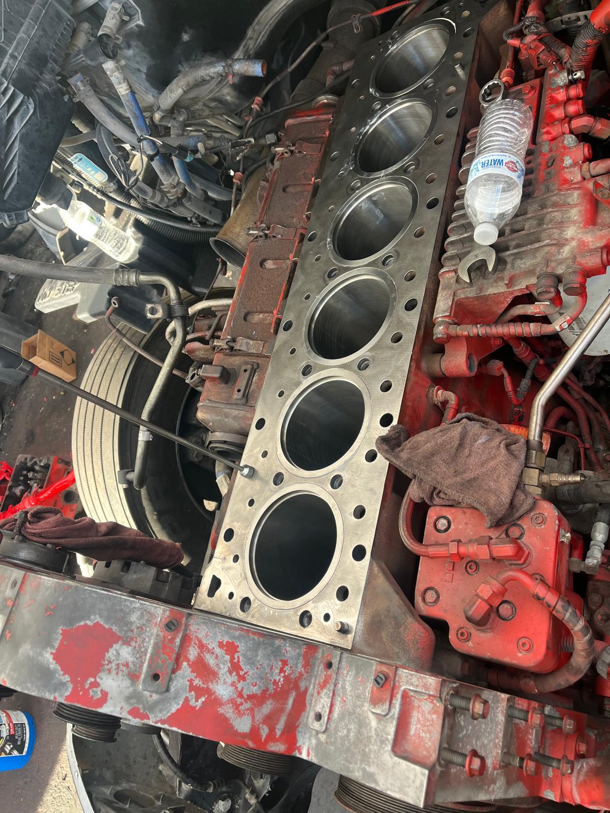 New cylinder liners installed in a rebuilt diesel engine