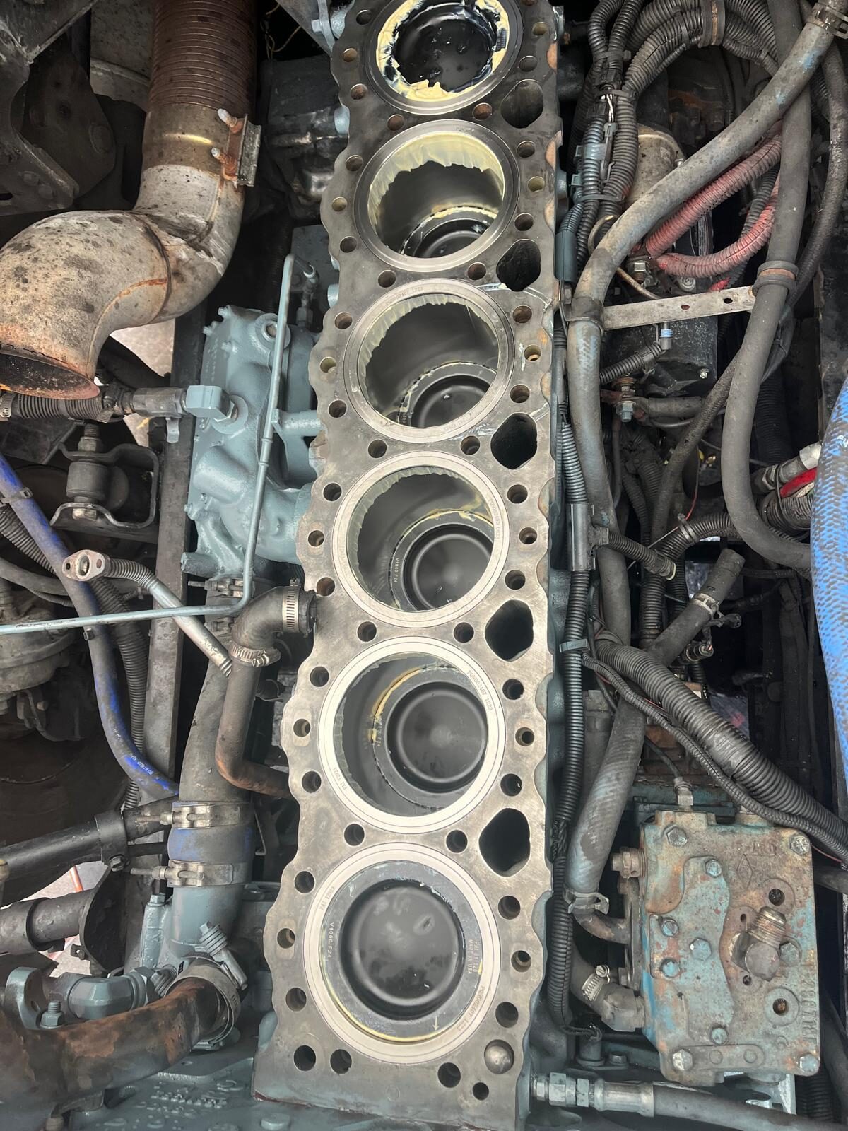 Engine block in-frame with cylinder sleeves visible