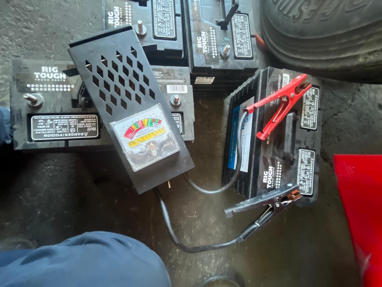 Truck batteries being tested during electrical diagnosis